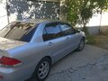 2007 Mitsubishi Lancer IX Рестайлинг, серебристый, 400000 рублей - вид 2