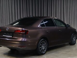 2016 Volkswagen Jetta VI Рестайлинг, коричневый, 1099000 рублей, вид 2