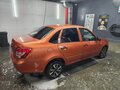 2014 Lada (ВАЗ) Granta I, оранжевый, 350000 рублей - вид 4