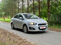 2012 Chevrolet Aveo II, серебристый, 255000 рублей