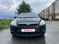 2010 Ford Focus II Рестайлинг, чёрный, 530000 рублей - вид 1