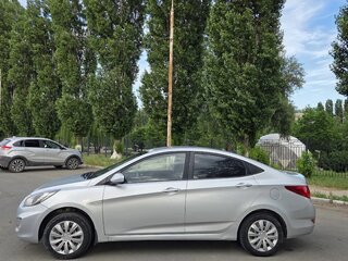 2011 Hyundai Solaris I, серебристый, 610000 рублей, вид 4