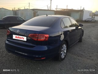 2015 Volkswagen Jetta VI Рестайлинг, синий, 1535000 рублей, вид 4