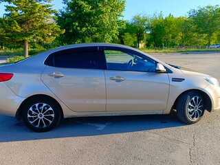 2012 Kia Rio 4-speed III, бежевый, 890000 рублей, вид 4