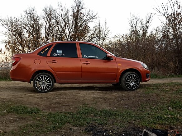 2013 Lada (ВАЗ) Granta I, оранжевый, 800000 рублей - вид 1