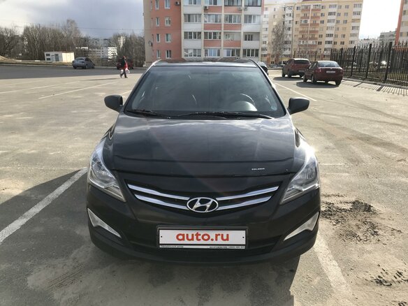 2014 Hyundai Solaris I Рестайлинг, чёрный - вид 1