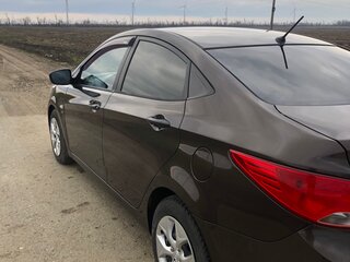 2015 Hyundai Solaris I Рестайлинг, коричневый, 905000 рублей, вид 4