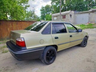 2006 Daewoo Nexia I, бежевый, 230000 рублей, вид 4