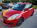 2011 Suzuki Swift IV, красный