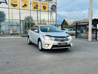 2014 Toyota Corolla XI (E160, E170, E180), серебристый, 1549000 рублей, вид 4