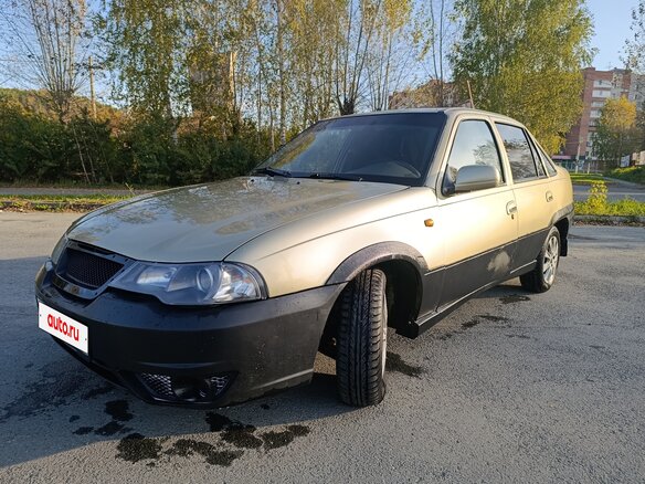 2010 Daewoo Nexia I Рестайлинг, золотистый, 95000 рублей