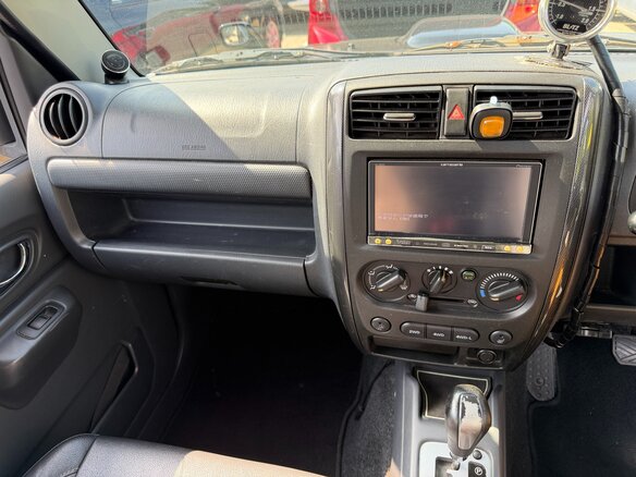 2010 Suzuki Jimny Kei car III Рестайлинг 1, чёрный - вид 12