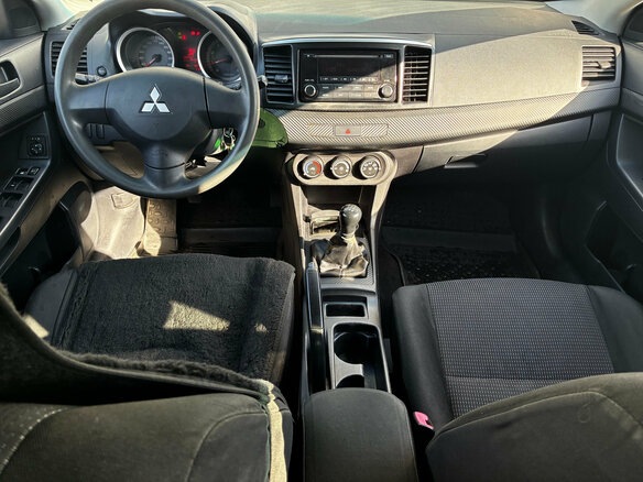 2007 Mitsubishi Lancer X, белый - вид 9