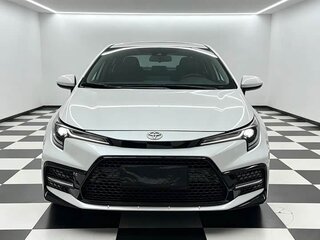 2023 Toyota Corolla Sporty XII (E210) Рестайлинг, белый, 1690000 рублей, вид 2