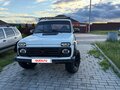1997 Lada (ВАЗ) 2121 (4x4) I Рестайлинг, белый, 280000 рублей - вид 1