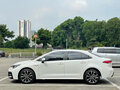 2023 Toyota Corolla Sporty XII (E210), белый, 1699000 рублей - вид 7