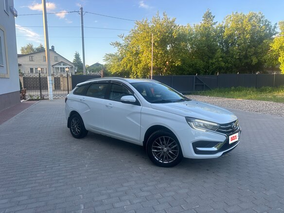 2025 Lada (ВАЗ) Vesta SW I Рестайлинг (NG), белый - вид 1