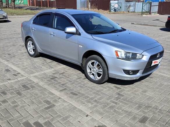 2007 Mitsubishi Lancer X, серебристый, 550000 рублей - вид 1
