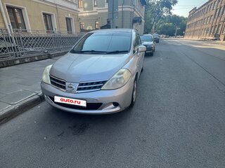 2010 Nissan Tiida I Рестайлинг, серебристый, 330000 рублей, вид 1