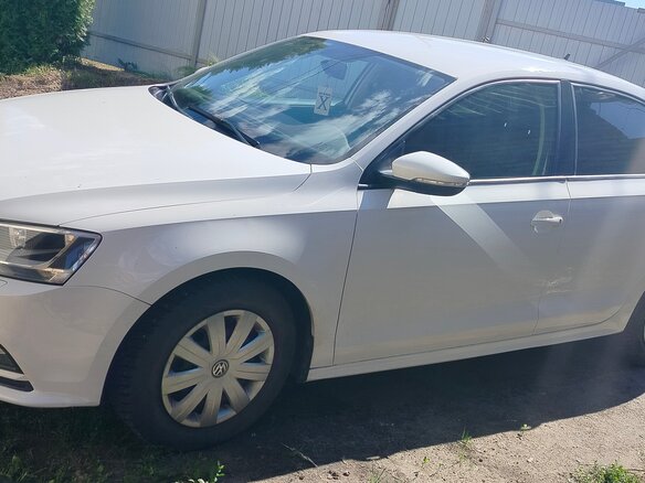 2015 Volkswagen Jetta VI Рестайлинг, белый, 890000 рублей - вид 1