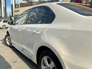 2015 Volkswagen Jetta VI Рестайлинг, белый, 610000 рублей, вид 4