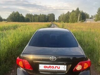 2007 Toyota Corolla X (E140, E150), чёрный, 600000 рублей, вид 3