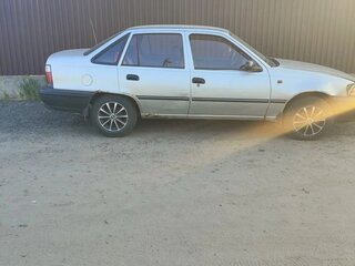 2005 Daewoo Nexia I, серебристый, 110000 рублей, вид 4