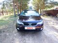 2010 Kia Cerato 6-speed II, пурпурный, 700000 рублей - вид 1