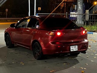 2011 Mitsubishi Lancer X Рестайлинг, красный, 550000 рублей, вид 3