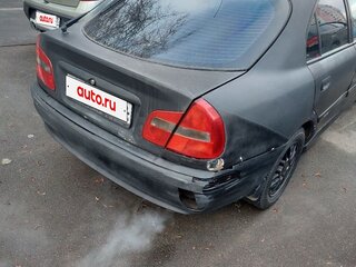 2001 Mitsubishi Carisma I Рестайлинг, чёрный, 210000 рублей, вид 4