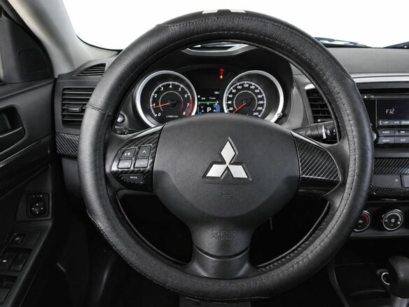 2012 Mitsubishi Lancer X Рестайлинг, чёрный, 790000 рублей - вид 10