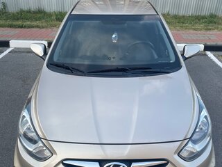 2011 Hyundai Solaris I, коричневый, 780000 рублей, вид 1