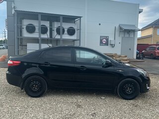 2011 Kia Rio 5-speed III, чёрный, 770000 рублей, вид 5