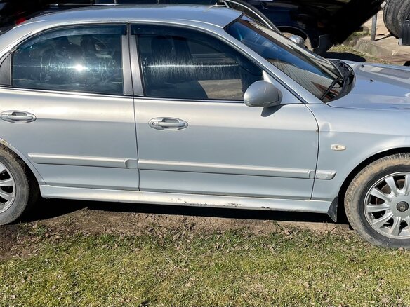 2009 Hyundai Sonata ТагАЗ IV (EF) Рестайлинг, серебристый, 320000 рублей - вид 2