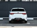 2020 Kia Rio IV Рестайлинг, белый - вид 3