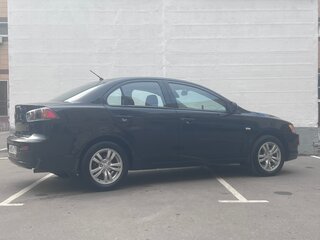 2010 Mitsubishi Lancer X, чёрный, 795000 рублей, вид 4