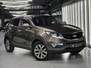 2015 Kia Sportage III Рестайлинг, коричневый, 1690000 рублей, вид 1