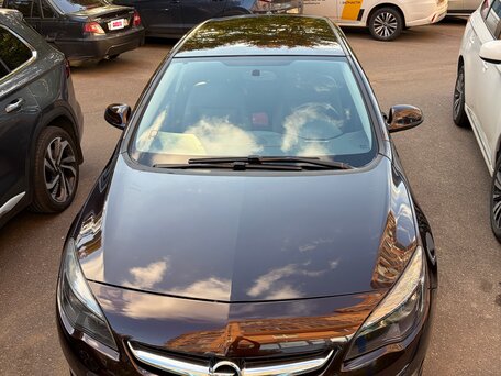 2014 Opel Astra J Рестайлинг, коричневый, 990000 рублей, вид 2