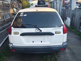 2001 Mazda Familia Y11, белый, 145000 рублей, вид 1