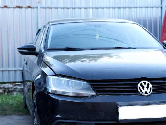 2013 Volkswagen Jetta VI, чёрный - вид 2
