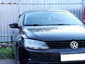 2013 Volkswagen Jetta VI, чёрный - вид 2