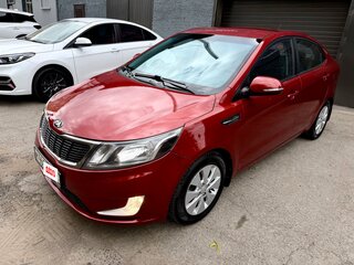2014 Kia Rio 5-speed III, красный, 860000 рублей, вид 1