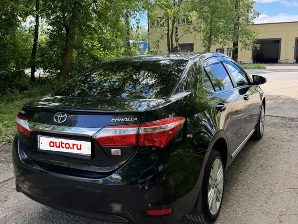 2013 Toyota Corolla XI (E160, E170, E180), чёрный, 1450000 рублей - вид 5
