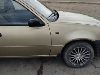 2011 Daewoo Nexia I Рестайлинг, жёлтый, 300000 рублей, вид 4