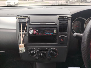 2010 Nissan Tiida I Рестайлинг, серебристый, 650000 рублей, вид 4