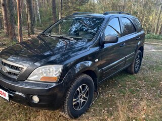 2011 Kia Sorento I Рестайлинг, чёрный, 850000 рублей, вид 1