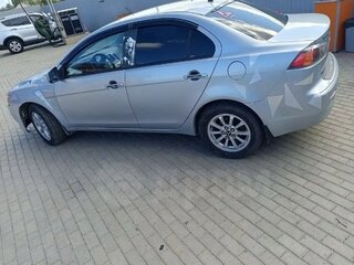 2012 Mitsubishi Lancer X Рестайлинг, серебристый, 760000 рублей, вид 4