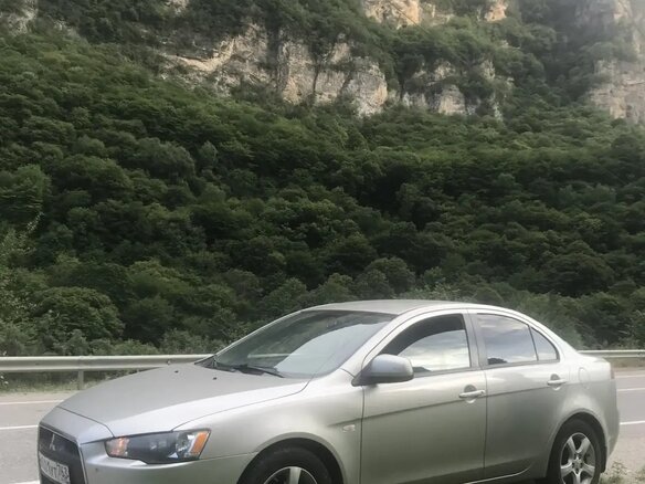 2013 Mitsubishi Lancer X Рестайлинг, серебристый, 799900 рублей - вид 5