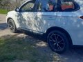2016 Mitsubishi Outlander III Рестайлинг 2, белый, 1699000 рублей - вид 4