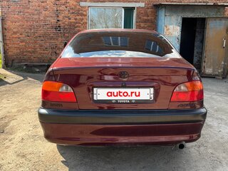 1998 Toyota Avensis I, пурпурный, 450000 рублей, вид 3